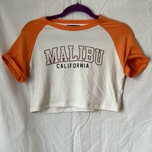 orange and white crop top